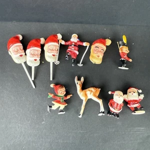 Lote de 10 figuras pequeñas de plástico de colección cabezas de Papá Noel y varias fiestas - Imagen 1 de 15