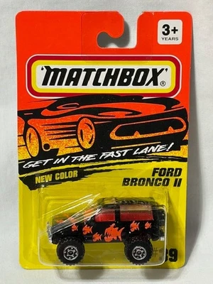 Matchbox #39 Ford Bronco II, negro, piraña, nuevo en caja, 1/64 Foto 1 de 3