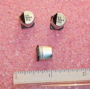 QTY (20) 33uf 100V 85' SMD ALUMINUM ELECTROLYTIC CAPACITORS AVS336M2AG24T CDE - Picture 1 of 1
