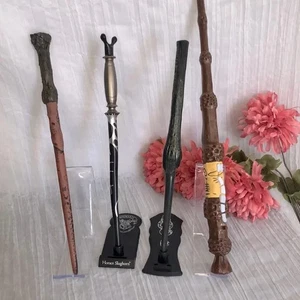 HARRY POTTER WANDS LOT 4-2 Harry Potter light up, Slughorn's & Bellatrix's wand - Picture 1 of 11