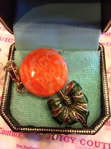 Nuevo sin etiquetas 2005 Juicy Couture ""Juicy Pop"" Naranja Piiruleta Dije En muy buen estado - Imagen 1 de 2