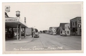MAIN STREET CARLTON MINNESOTA RPPC POSTCARD MOBILGAS STATION CARS SIGNS - Picture 1 of 2