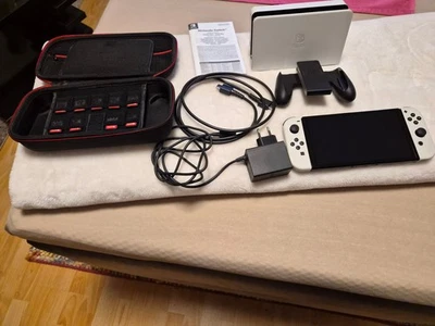 Nintendo Switch OLED-Modell HEG-001 64GB Handheld-Spielekonsole - Weiß - Bild 1 von 4