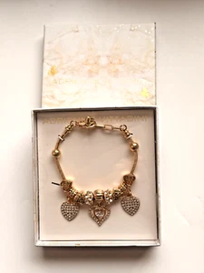 PULSERA ADRIENNE VITTADINI TONO ORO CRISTAL CORAZÓN DIJE - Imagen 1 de 1