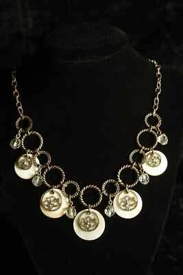 Vintage Avon signed bib necklace with shell, glass, and metal flower accents - Image 1 of 4