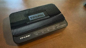 Routeur modem TP-Link TD-8816 - Occasion en parfait état (ADSL2+) - Photo 1/4