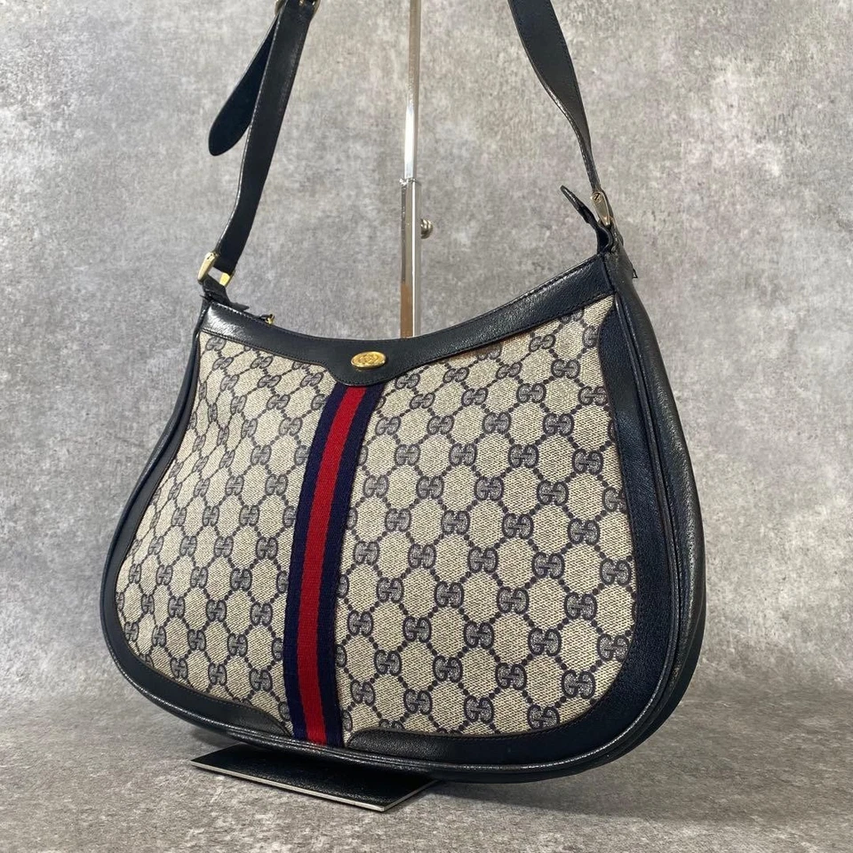 Auténtico Bolso de Hombro Gucci Sherry Line GG Supreme PVC Media Luna Cuero Azul Marino Foto 1 de 4