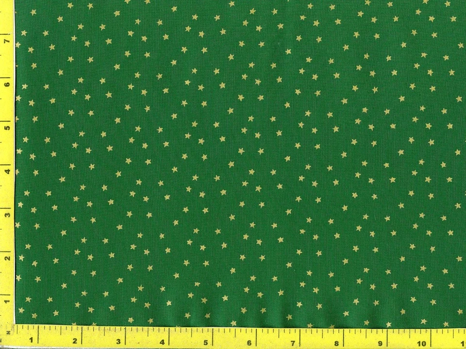 Metallic Gold Stars on Green Christmas Quilting & Sewing Fabric by Yard #3014 - Image 1 of 1