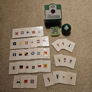 American Girl Scout Metal Camera Tin Headphones Stress Ball Boat Flag Flashcards - Picture 1 of 13