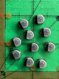 22uF 50v Surface Mount Electrolytic Capacitor UWX1H220MCL1GB  8mm Diameter 10pcs - Picture 1 of 4