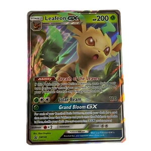 Pokemon TCG SM146 Leafeon GX Foil Promo Black Star Rare With Charizard Sleeve - Picture 1 of 6