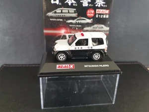 Black/White Police Mitsubishi Pajero 1/72 Real-X Boxed - Picture 1 of 1