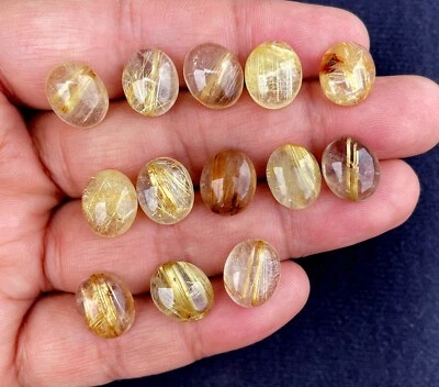 Natural Golden Rutilated Quartz Oval Cabochon 12x10 MM Wholesale Loose Gemstone - Image 1 of 4
