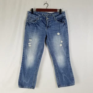 Jeans Rue21 Juniors 7 tiro bajo recortado bootcut desgastado lavado medio azul denim - Imagen 1 de 14