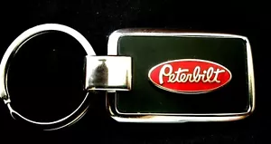 Peterbilt ónix negro con adorno plateado grabado sin llavero en la espalda - Imagen 1 de 2