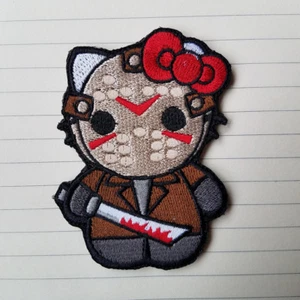 HELLO KITTY AS JASON FRIDAY THE 13TH CARTOON EMBROIDERED HOOK PATCH BADGE BROWN - Picture 1 of 3