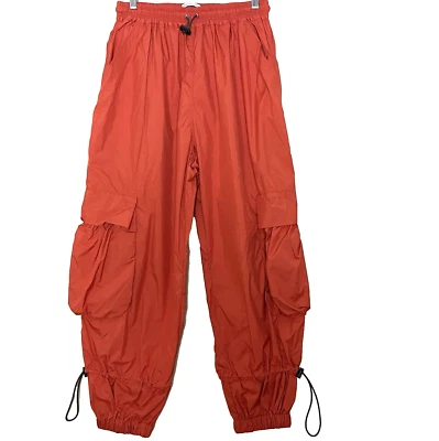 Pantalones utilitarios Urban Outfitters naranja globo cargo talla pequeña paracaídas Foto 1 de 4