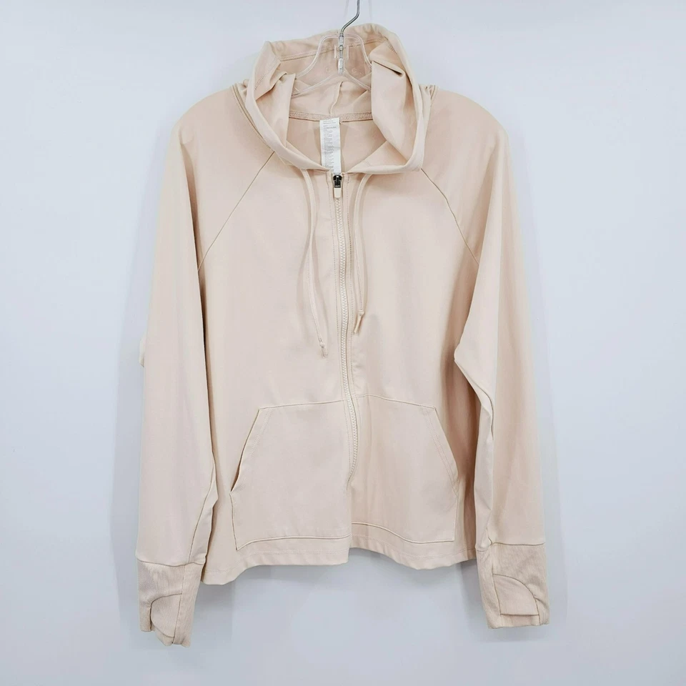 Sudadera con Capucha Recortada Fabletics Oasis 1X Manga Raglán Arena Cremallera Completa Bolsillos Cuadrados Plus Foto 1 de 4