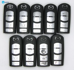 Mixed Lot x9 OEM Mazda Keyless Entry Smartkey Remote Keys Used TESTED - Picture 1 of 3