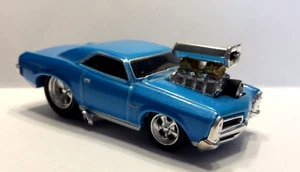 MUSCLE MACHINES 1966 PONTIAC GTO - LIMITED EDITION 1/64 DIECAST 66 GTO - Picture 1 of 4