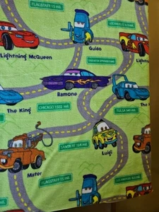 Disney Cars Radiator Springs Fleece fabric 1 yd Lightening McQueen Luigi Mater - Picture 1 of 3