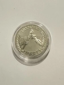 1988-D Denver Mint- Seoul Olympiad Commemorative Silver Dollar - In Capsule. - Picture 1 of 3