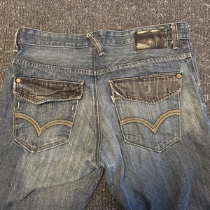 Levi's Herren 34 x 31 * Medium Wash Silver Tab Boot Cut verzierte Tasche Denim Jeans - Bild 1 von 10