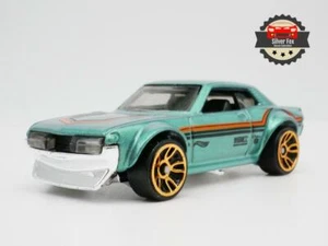 TOYOTA CELICA 1970 VERDE METALLIZZATO SCALA 1:64 MODELLINO DA COLLEZIONE PRESSOFUSO - Foto 1 di 9