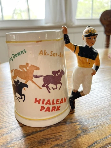 Vintage Swank  Hialeah park etc ” Horse Racing Orange Jockey Ceramic Mug stein Cover