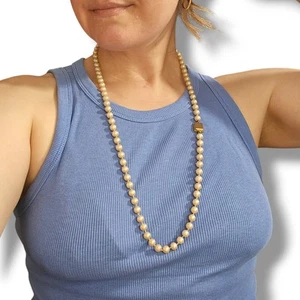 vintage Long Faux Pearl Necklace by Anne Klein iridescent cream tone knotted - Picture 1 of 6