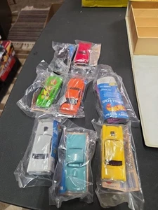 Lotto 8 giocattoli vintage McDonald's Happy Meal 1990 Hot Wheels auto nuove/sigillate - Foto 1 di 3