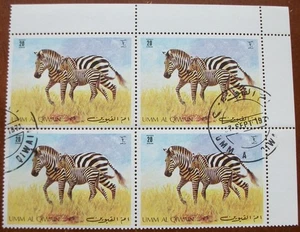 Francobolli blocco di 4 UMM AL QIWAIN 1971 Zebra ges. - Foto 1 di 2