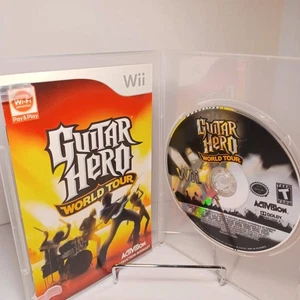 Wii Guitar Hero World Tour nur Disk und Handbuch getestet und funktionsfähig - Bild 1 von 5