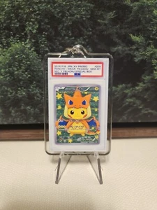 2016 Pokemon Japanese Poncho Pikachu Charizard Gem Mint Gift Keychain 2x3 🔥 - Picture 1 of 5