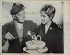 1959 Press Photo Leigh Madison Watches A.E. Matthews Cut Birthday Cake In London