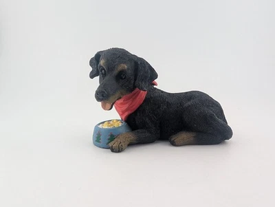 Estatueta Bobblehead de Natal pequena cachorro preto com tigela de comida - Imagem 1 de 4