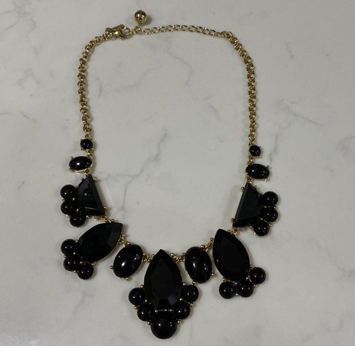Collana bavaglino Kate Spade Statement tono oro nero sfaccettato a forma di goccia pietra