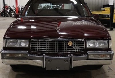 Cadillac Deville Fleetwood 1989-1993 tracción delantera OEM soporte de matrícula 25532339 Foto 1 de 4