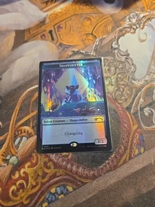 Gettone Shapeshifter Foil 1908 MTG Tana Segreta - Nuovo con scatola - - Foto 1 di 2