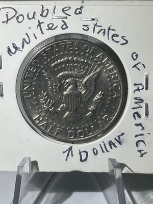 Kennedy 1980 medio dólar RDA error inverso Foto 1 de 4