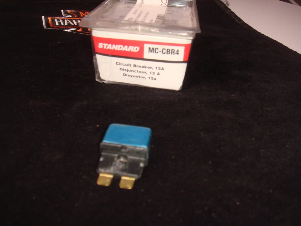 Disyuntor Harley 15 Amp FLH FXST 1994 Up Electra 74587-94 EE. UU. MC-CBR4 H1 Foto 1 de 4