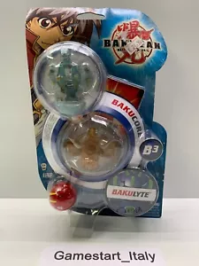 BAKUGAN BATTLE BRAWLERS BAKULYTE B3 TRIPLE PACK CLEAR TRANSLUCENT - NEW SEALED - Foto 1 di 7
