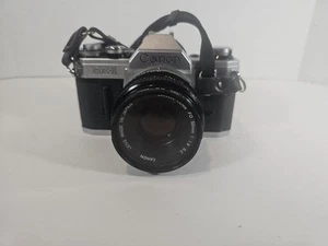 Canon AE-1 schwarz analoge Kleinbildkamera 50 mm f/1: 1.8 S.C. Objektiv JAPAN - Bild 1 von 8