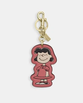 Coach X Peanuts 2025 Lucy Bolso de Cuero Dije Llavero CBG58 Rosa Aniversario Foto 1 de 4