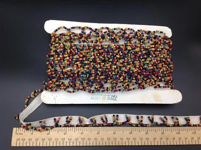 Cinta de sarga con cuentas de madera multicolor con flecos para costura artesanal Foto 1 de 4