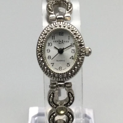 Reloj LA Express Mujer 18mm Tono Plateado Marcasita Esfera Ovalada Batería Nueva 6.75" Foto 1 de 4