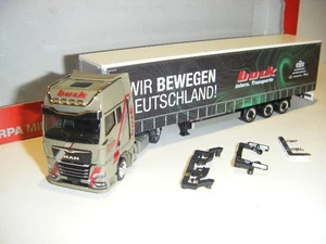 Herpa 317818 MAN TGX GX Megatrailer GPSZ Buck Transporte - Bild 1 von 8
