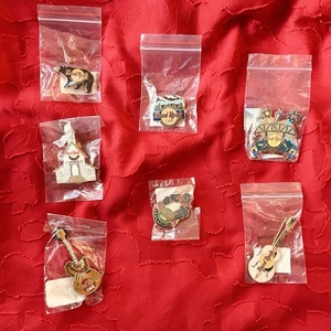 HARD ROCK CAFÉ... Gatlinburg TN... Lote de 7 prendedores... NUEVO en PAQUETE - Imagen 1 de 5