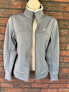Nike Therma-Fit Jacke klein langärmelig mit durchgehendem Reißverschluss Taschen Kordelzug grau weiß