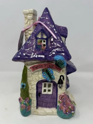 Blue Sky Clayworks: Heather Goldminc; Ceramic, Pansy Place Candle House 8.5” htf - Image 1 of 4
